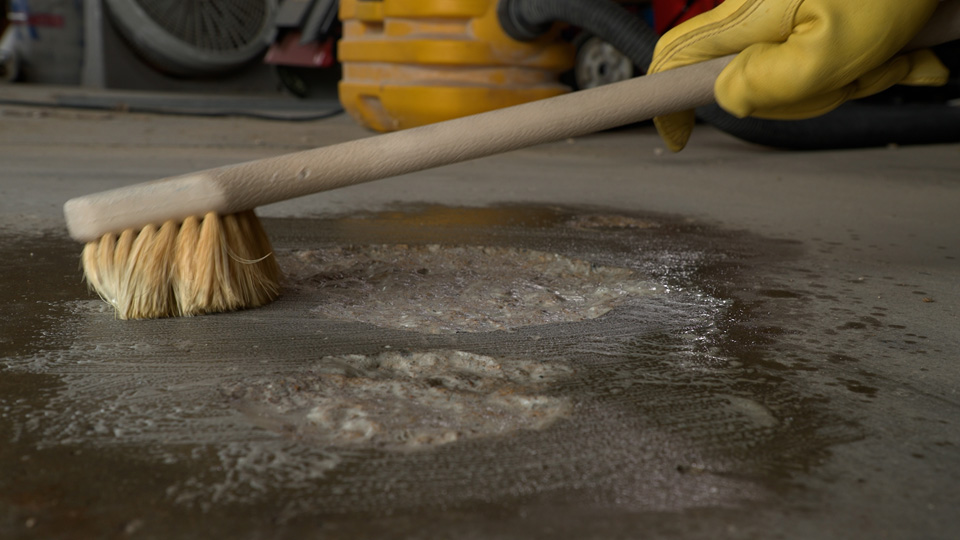 scrubbing with a utility brush